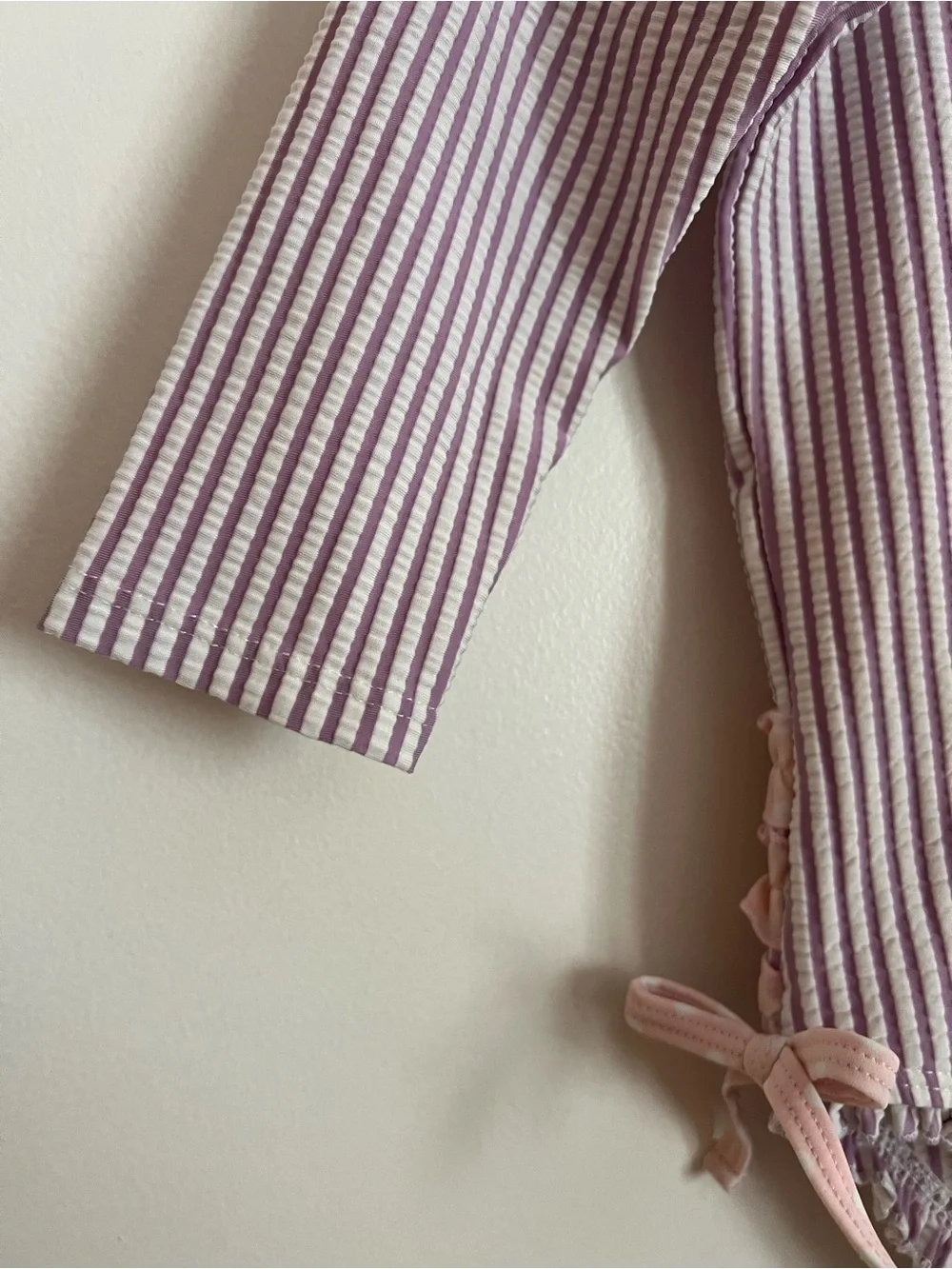 Ruffle Butts purple striped swimsuit